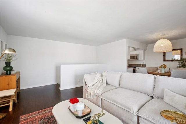 2704 Voorhees Ave Unit 4, Redondo Beach, CA 90278 - living area featuring wood finished floors and baseboards