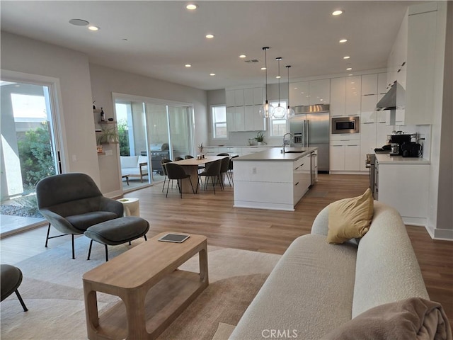 171 Bear Leaf Dr, Lake Forest, CA 92630 - living area featuring recessed lighting and light wood finished floors