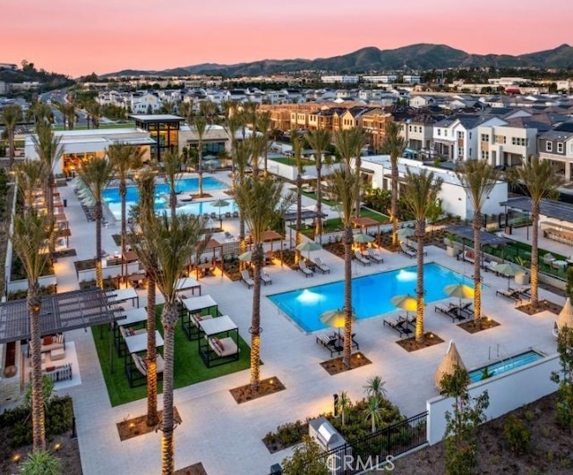 171 Bear Leaf Dr, Lake Forest, CA 92630 - aerial view of residential area with a pool area and a mountain backdrop