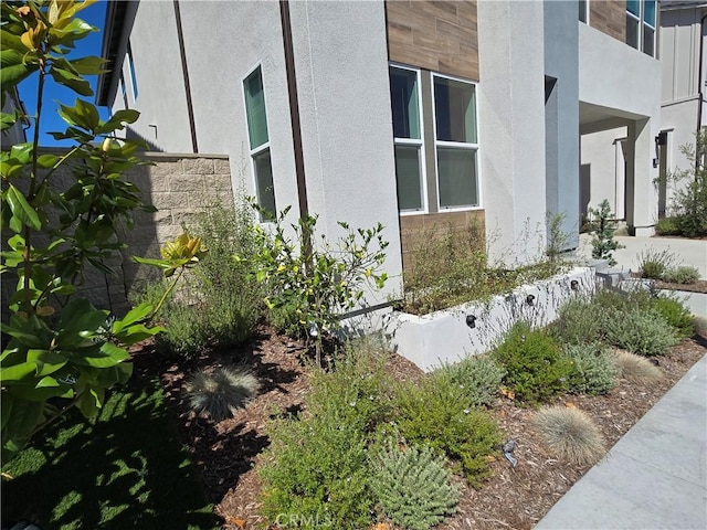 171 Bear Leaf Dr, Lake Forest, CA 92630 - view of side of property featuring stucco siding