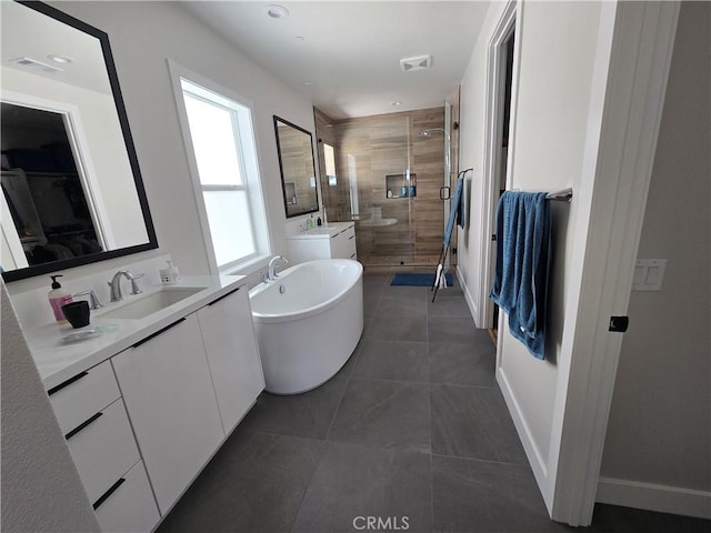 171 Bear Leaf Dr, Lake Forest, CA 92630 - full bath with a shower stall, vanity, a soaking tub, tile patterned floors, and recessed lighting
