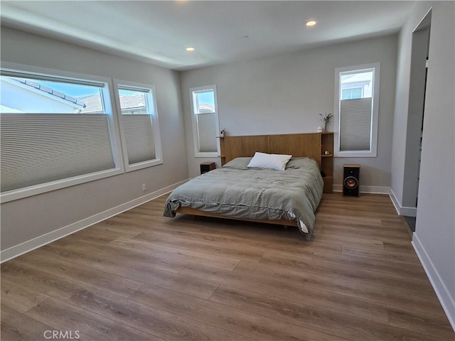 171 Bear Leaf Dr, Lake Forest, CA 92630 - bedroom featuring wood finished floors, multiple windows, and recessed lighting