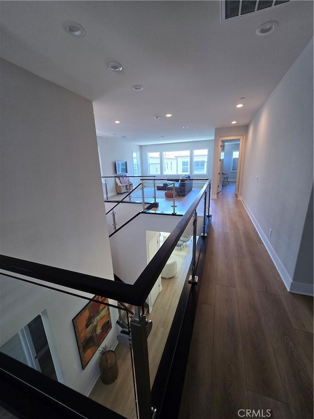 171 Bear Leaf Dr, Lake Forest, CA 92630 - hall with recessed lighting, wood finished floors, and an upstairs landing