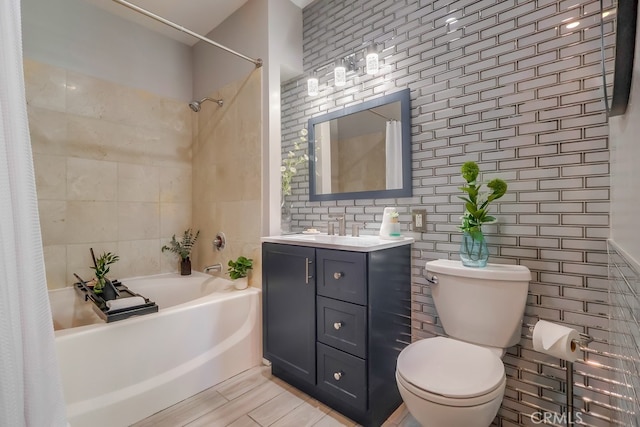 488 E Ocean Blvd Unit 502, Long Beach, CA 90802 - bathroom with shower / tub combo, vanity, and tile walls