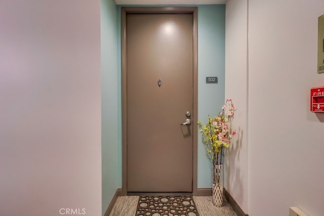 488 E Ocean Blvd Unit 502, Long Beach, CA 90802 - doorway to outside featuring baseboards