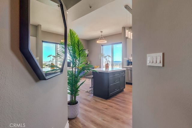488 E Ocean Blvd Unit 502, Long Beach, CA 90802 - hallway with light wood finished floors and a textured wall
