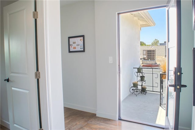 542 N Kilkea Dr, Los Angeles, CA 90048 - hall with baseboards and wood finished floors