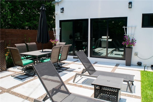 542 N Kilkea Dr, Los Angeles, CA 90048 - view of patio / terrace featuring outdoor dining area and a grill