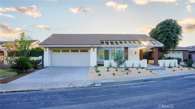 317 Calle Familia, San Clemente, CA 92672 - view of front of house with a garage, concrete driveway, and stucco siding