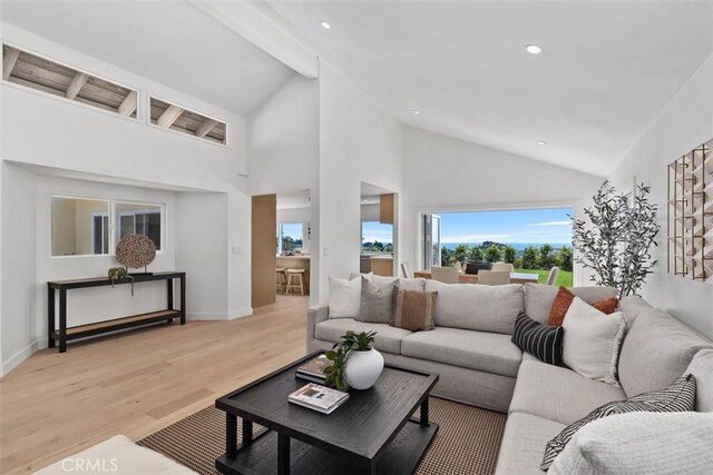 317 Calle Familia, San Clemente, CA 92672 - living room with light wood-style floors, high vaulted ceiling, beam ceiling, and recessed lighting