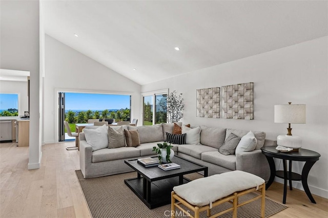 317 Calle Familia, San Clemente, CA 92672 - living area with high vaulted ceiling, light wood-style flooring, plenty of natural light, and recessed lighting