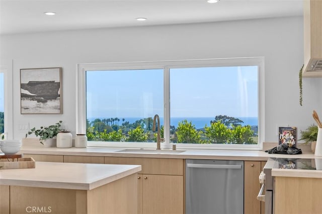 317 Calle Familia, San Clemente, CA 92672 - kitchen featuring stainless steel dishwasher, light brown cabinets, light countertops, and recessed lighting