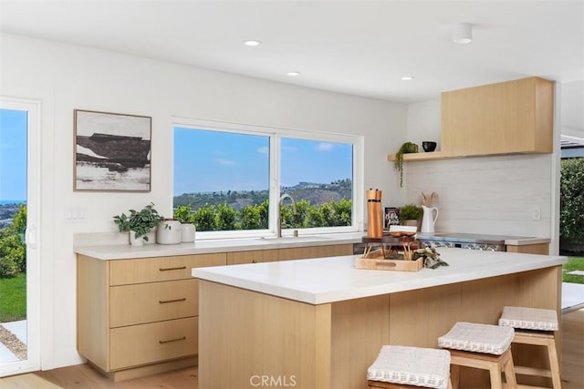 317 Calle Familia, San Clemente, CA 92672 - kitchen with light brown cabinets, light countertops, and recessed lighting