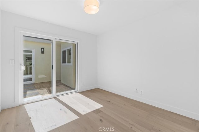 317 Calle Familia, San Clemente, CA 92672 - unfurnished room featuring wood finished floors and baseboards