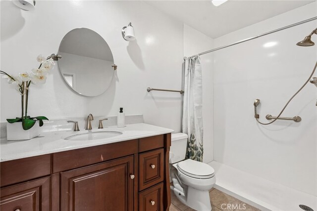 1737 Peyton Ave Unit E, Burbank, CA 91504 - bathroom featuring vanity, curtained shower, and tile patterned flooring