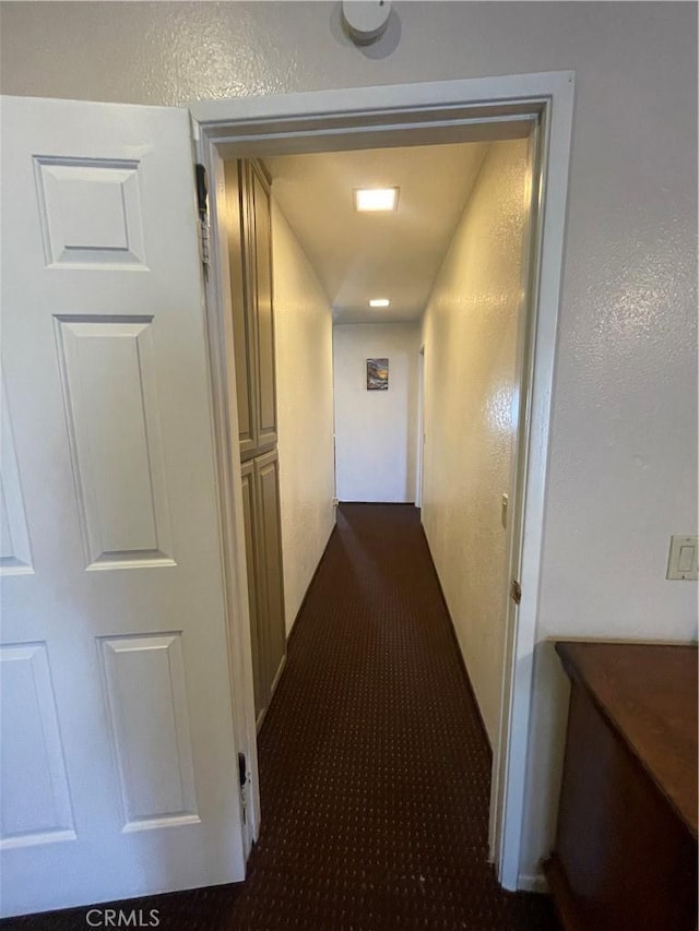 4153 N Webster Ave, Perris, CA 92571 - corridor with dark carpet