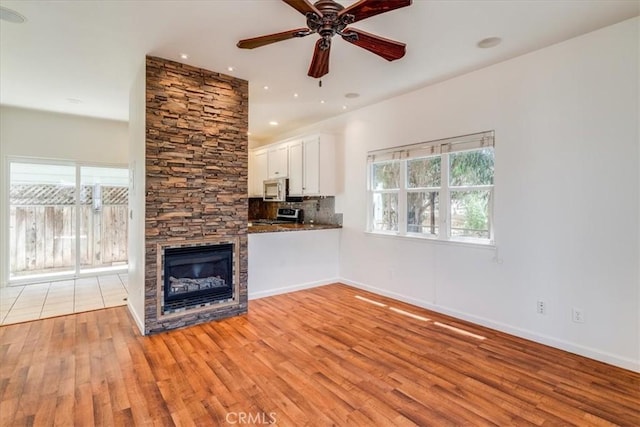 558 Adina Way, Nipomo, CA 93444 - unfurnished living room with light wood-style flooring, ceiling fan, healthy amount of natural light, and recessed lighting