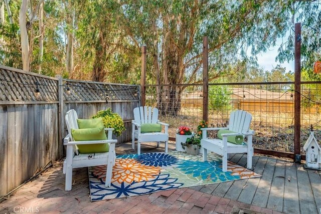 558 Adina Way, Nipomo, CA 93444 - fenced backyard featuring a deck and a patio area