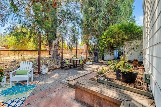 558 Adina Way, Nipomo, CA 93444 - fenced backyard with outdoor dining space and a deck