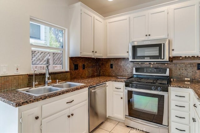 558 Adina Way, Nipomo, CA 93444 - kitchen featuring appliances with stainless steel finishes, white cabinets, backsplash, and light tile patterned flooring