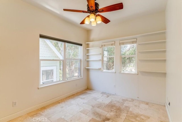 558 Adina Way, Nipomo, CA 93444 - empty room with healthy amount of natural light, a ceiling fan, and light stone finish floors