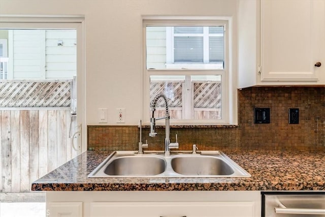 558 Adina Way, Nipomo, CA 93444 - kitchen with dark countertops, tasteful backsplash, and white cabinets