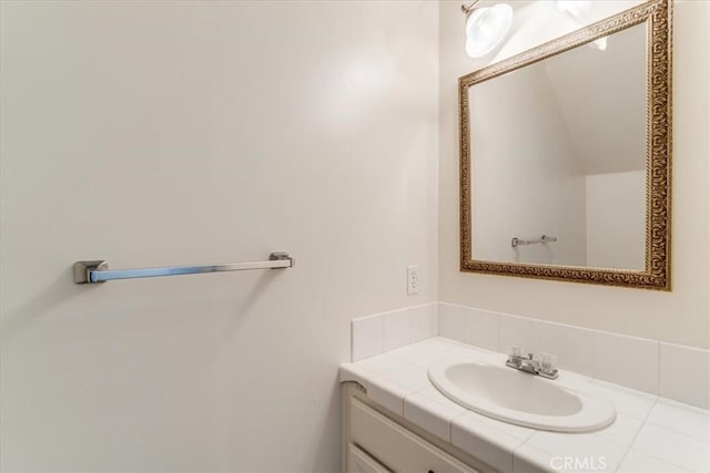 558 Adina Way, Nipomo, CA 93444 - bathroom with vanity and decorative backsplash