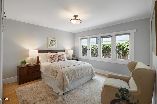 1036 N Chester Ave, Pasadena, CA 91104 - bedroom featuring crown molding and light wood finished floors