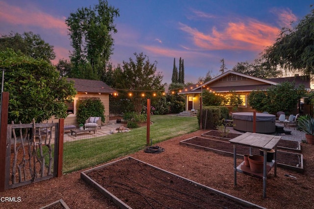 1036 N Chester Ave, Pasadena, CA 91104 - view of green lawn featuring a garden, a patio area, and a hot tub