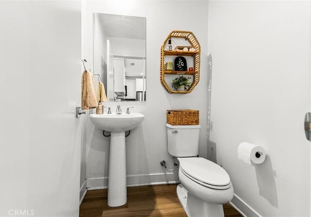 1206 W Cara Dr, Anaheim, CA 92805 - bathroom with toilet and wood finished floors