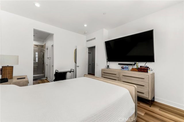1206 W Cara Dr, Anaheim, CA 92805 - bedroom with wood finished floors, recessed lighting, and ensuite bath
