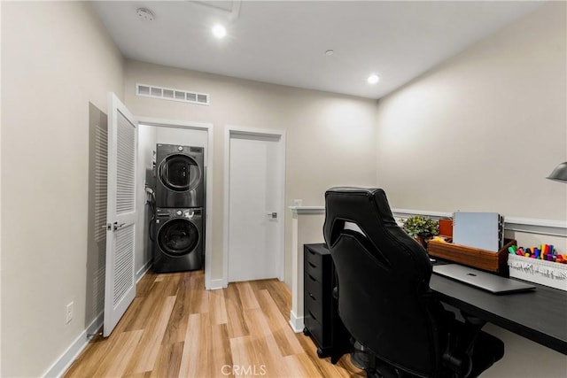 1206 W Cara Dr, Anaheim, CA 92805 - home office featuring stacked washer and clothes dryer, light wood-type flooring, and recessed lighting