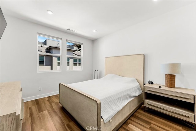 1206 W Cara Dr, Anaheim, CA 92805 - bedroom featuring wood finished floors and recessed lighting