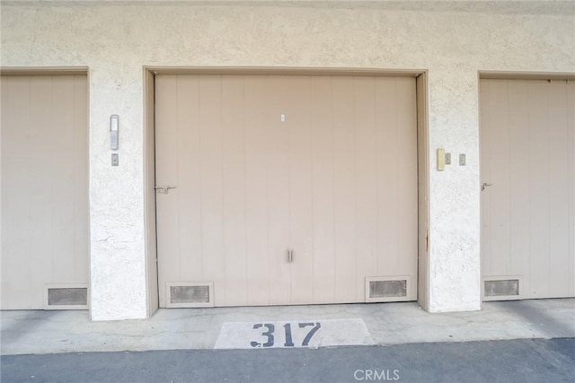 3342 Darby St Unit 317, Simi Valley, CA 93063 - doorway to property featuring elevator and stucco siding