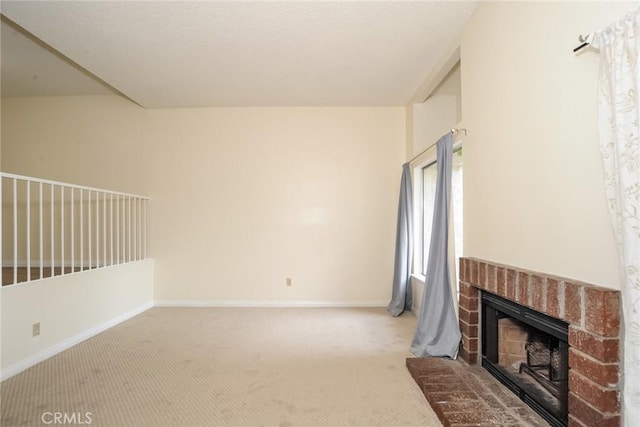 3342 Darby St Unit 317, Simi Valley, CA 93063 - unfurnished living room featuring carpet and a fireplace