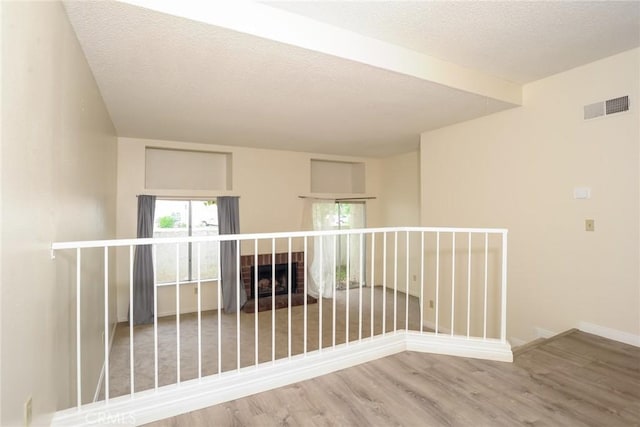 3342 Darby St Unit 317, Simi Valley, CA 93063 - empty room with wood finished floors and a textured ceiling