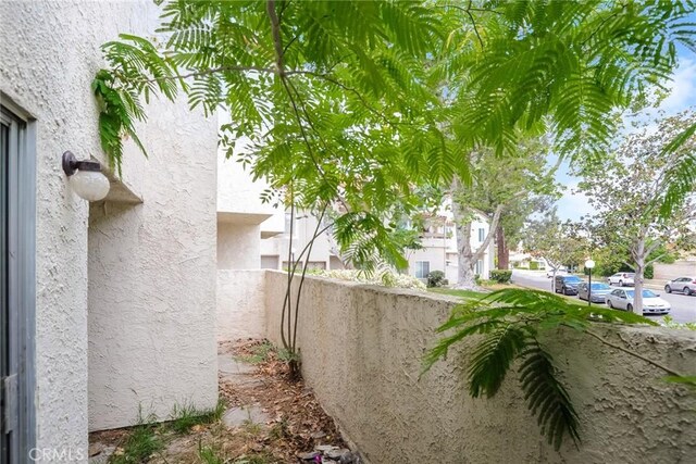 3342 Darby St Unit 317, Simi Valley, CA 93063 - view of side of home featuring stucco siding