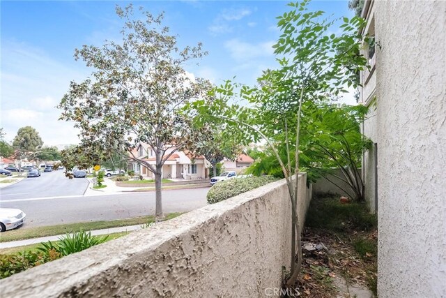 3342 Darby St Unit 317, Simi Valley, CA 93063 - view of asphalt street with sidewalks, a residential view, and curbs