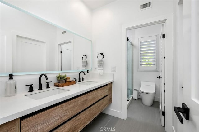 308 Via El Patio, San Clemente, CA 92673 - bathroom with double vanity, a stall shower, and tile patterned flooring