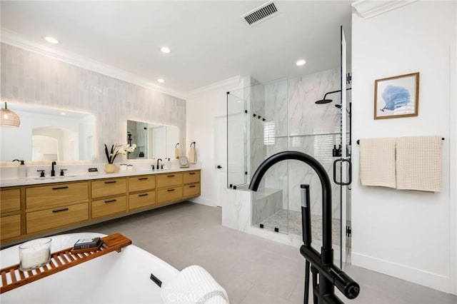 308 Via El Patio, San Clemente, CA 92673 - bathroom featuring ornamental molding, double vanity, a marble finish shower, recessed lighting, and a freestanding bath