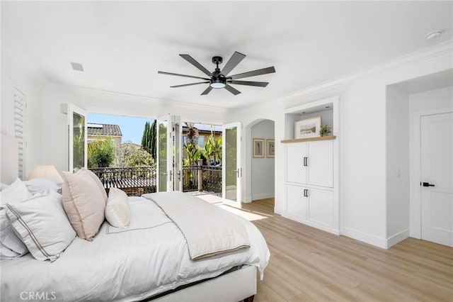 308 Via El Patio, San Clemente, CA 92673 - bedroom featuring access to exterior, light wood finished floors, arched walkways, crown molding, and a ceiling fan