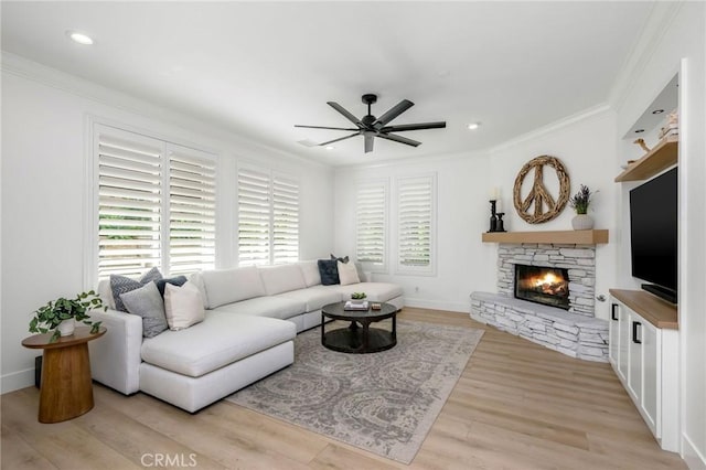 308 Via El Patio, San Clemente, CA 92673 - living room with a ceiling fan, ornamental molding, a stone fireplace, light wood-type flooring, and recessed lighting