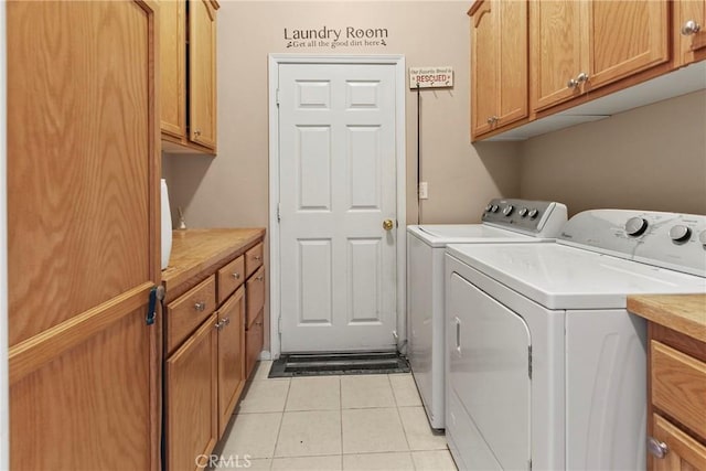 235 Cornuta Way, Nipomo, CA 93444 - laundry area featuring washer and dryer, cabinet space, and light tile patterned floors
