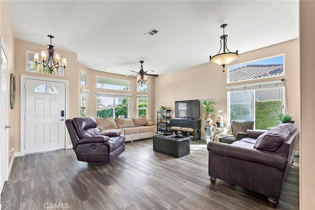 235 Cornuta Way, Nipomo, CA 93444 - living area featuring dark wood-type flooring, a chandelier, ceiling fan, and a high ceiling