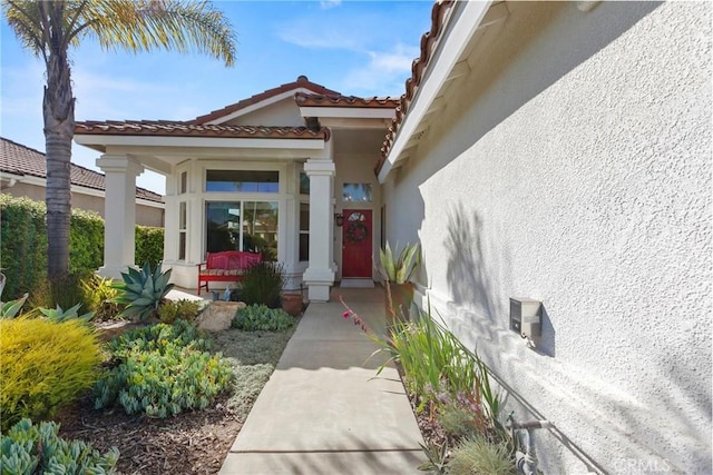 235 Cornuta Way, Nipomo, CA 93444 - entrance to property featuring stucco siding, covered porch, and a tiled roof