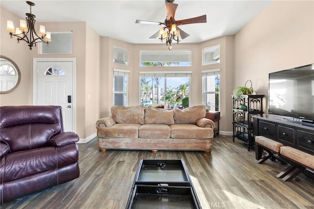 235 Cornuta Way, Nipomo, CA 93444 - living room featuring wood finished floors, a chandelier, ceiling fan, and a towering ceiling