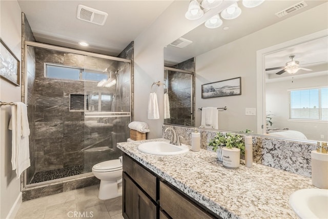 2740 Levi Ln, Chico, CA 95973 - bathroom with double vanity, a shower stall, tile patterned flooring, and ceiling fan