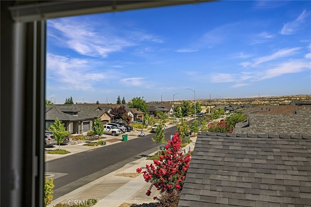 2740 Levi Ln, Chico, CA 95973 - view of asphalt street with a residential view, sidewalks, street lighting, and curbs