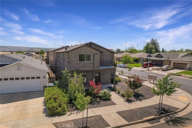 2740 Levi Ln, Chico, CA 95973 - view of front of property with a residential view, stucco siding, and concrete driveway