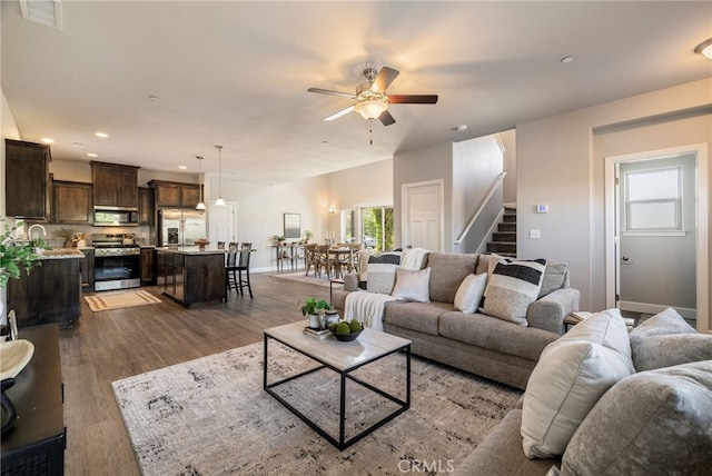2740 Levi Ln, Chico, CA 95973 - living area featuring ceiling fan, stairs, wood finished floors, and recessed lighting